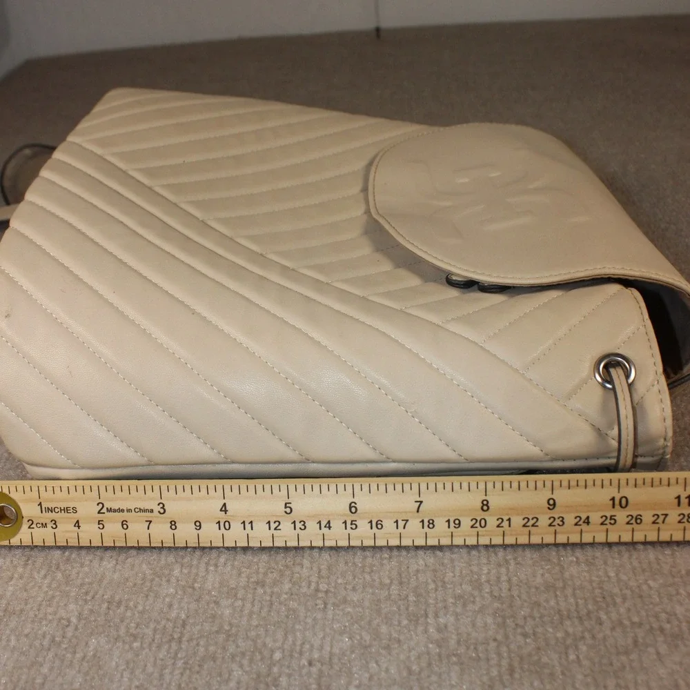 Sam Edelman Beige Quilted Faux Leather Drawstring Backpack Logo Flap Bag